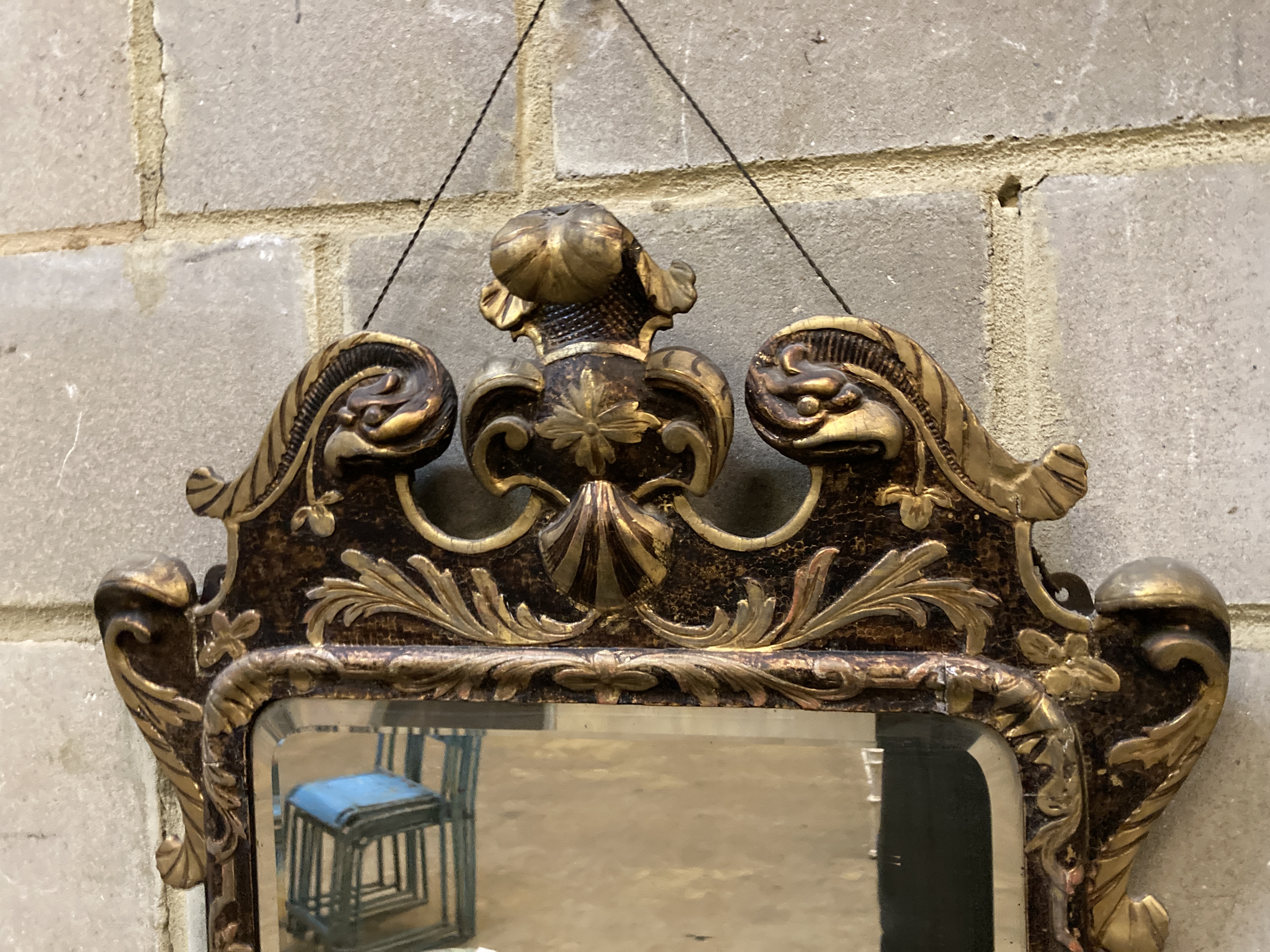 An 18th century and later fret cut girandole, width 56cm, height 96cm